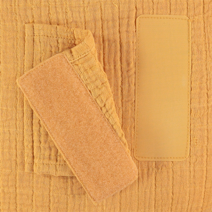 Coussin décoratif rond en tétra modulable en tour de lit ou de parc - Prémaman