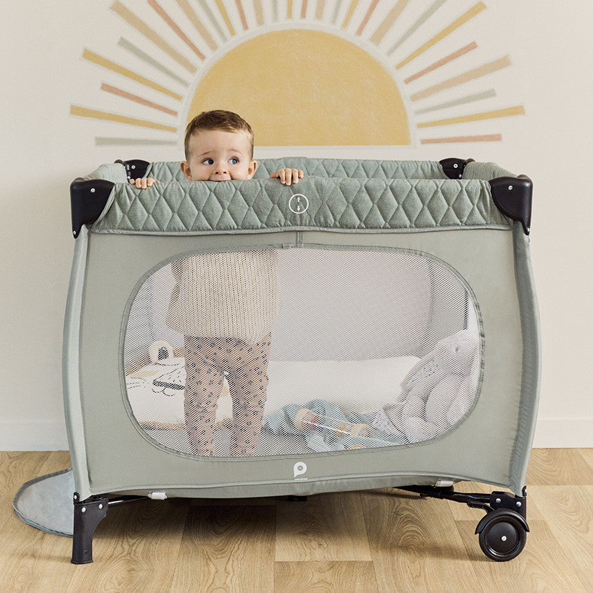 Parc de jeu pliant Quilty en filet avec roulettes vert - Prémaman